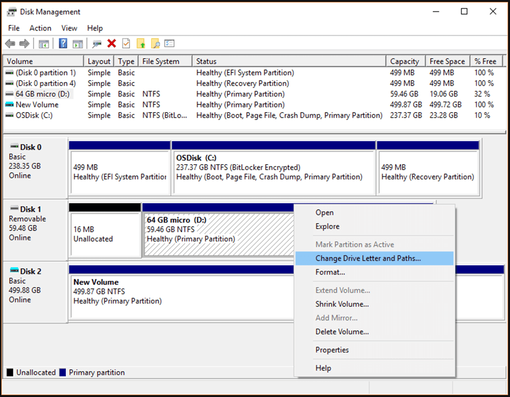 Press Windows + X and select Disk Management